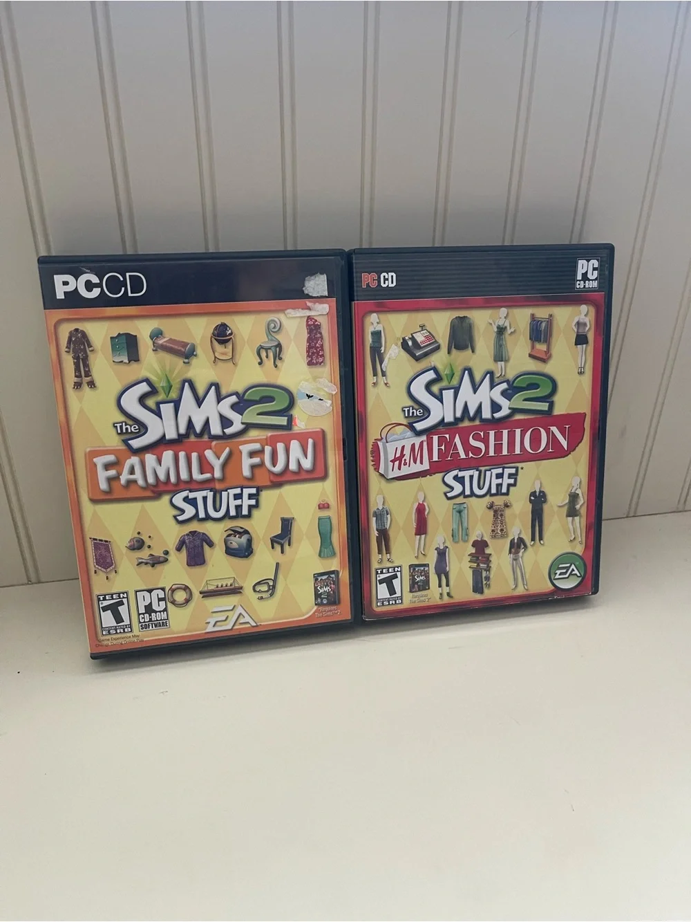 The Sims 2 Family Fun & H&M Fashion Stuff PC Game Bundle - Yellow